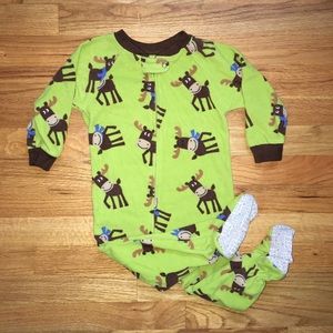 Fleece footie PJs. Zipper and snap closure.